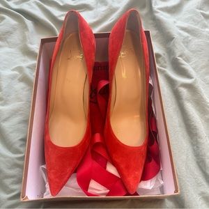 Christian Louboutin never worn orange suede pumps
